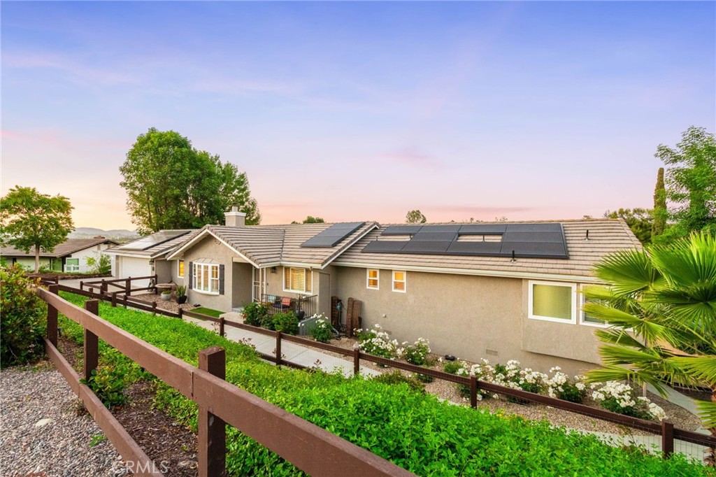 40337 Carmelita Circle Temecula, CA 92591 - Photo 54 of 65 a front view of a house with a yard