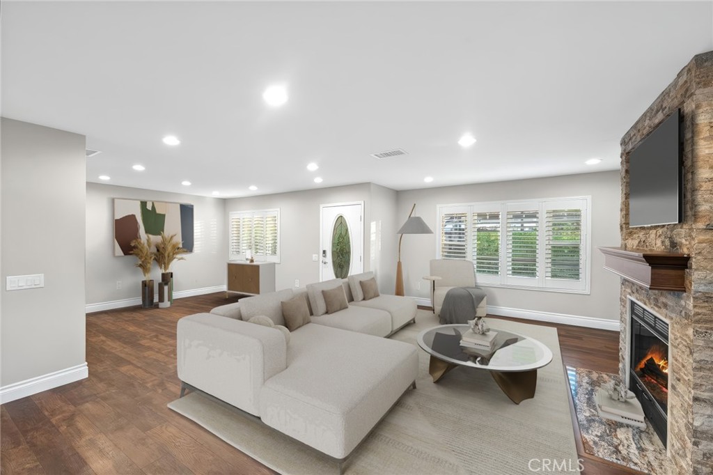 40337 Carmelita Circle Temecula, CA 92591 - Photo 7 of 65 a living room with fireplace furniture and a flat screen tv