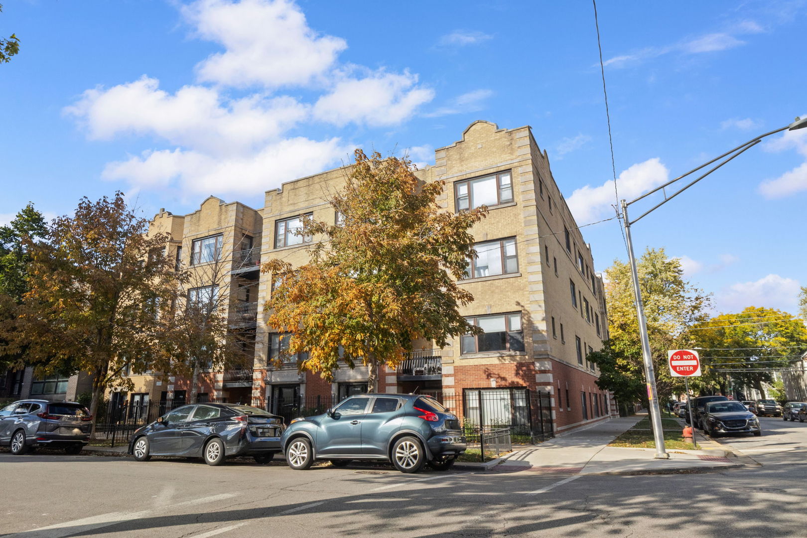 2704 West Cortland Street, Unit 3 Chicago, IL 60647 - Photo 2 of 24 a car parked in front of a building