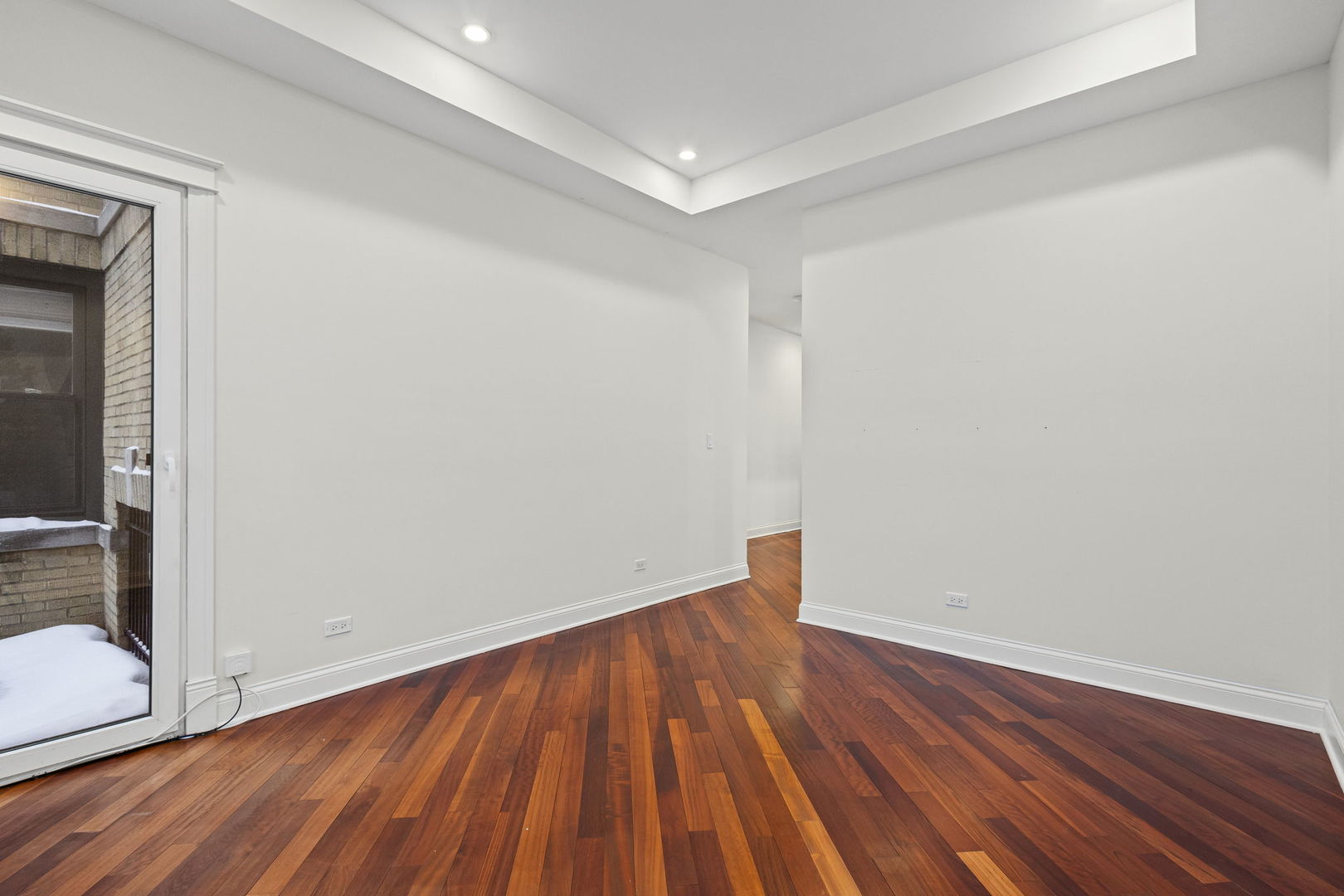 2704 West Cortland Street, Unit 3 Chicago, IL 60647 - Photo 8 of 24 a view of wooden floor in a room
