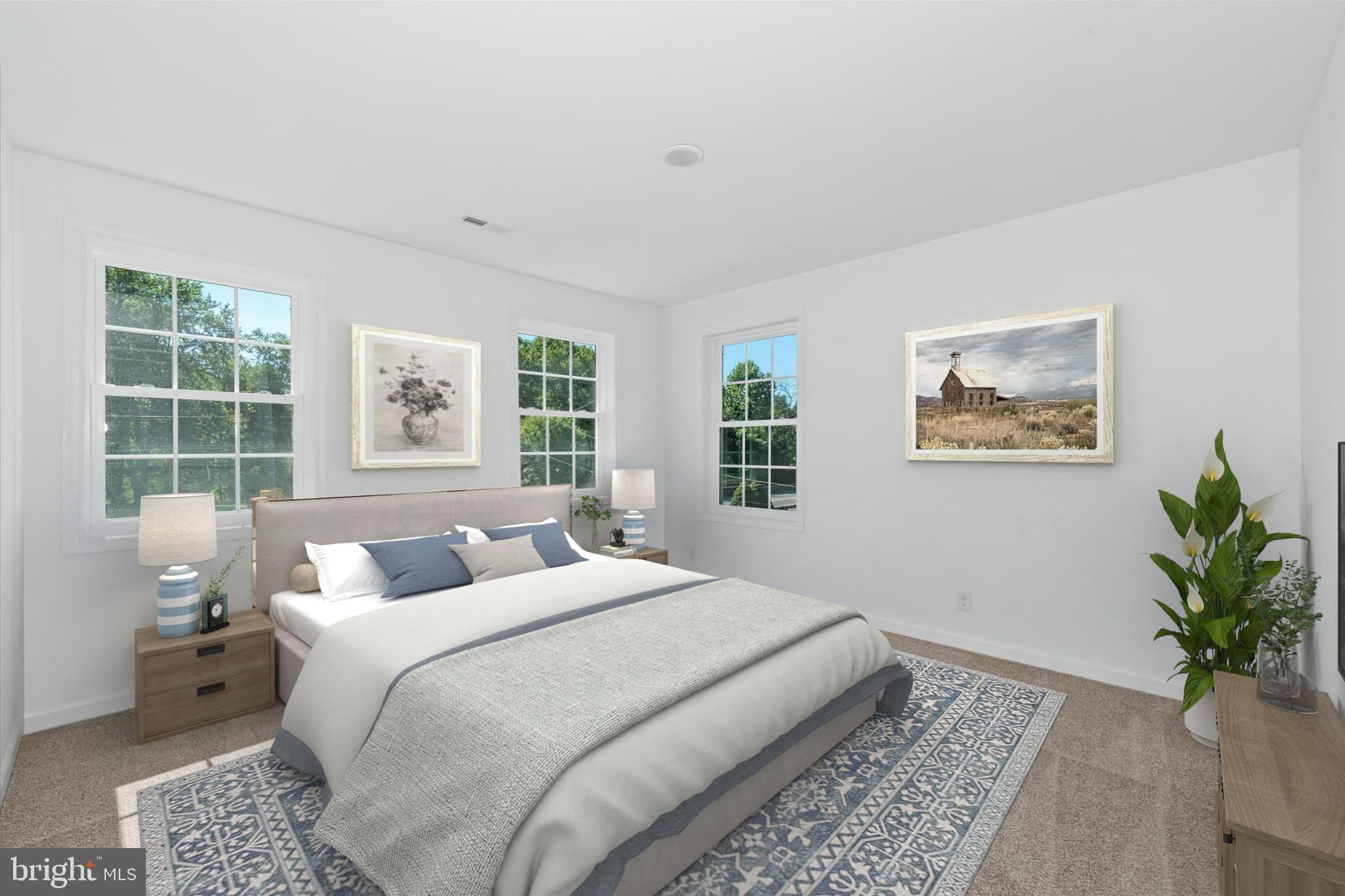 1239 Red Lion Road Bear, DE 19701 - Photo 15 of 29 a bedroom with a large bed and a window