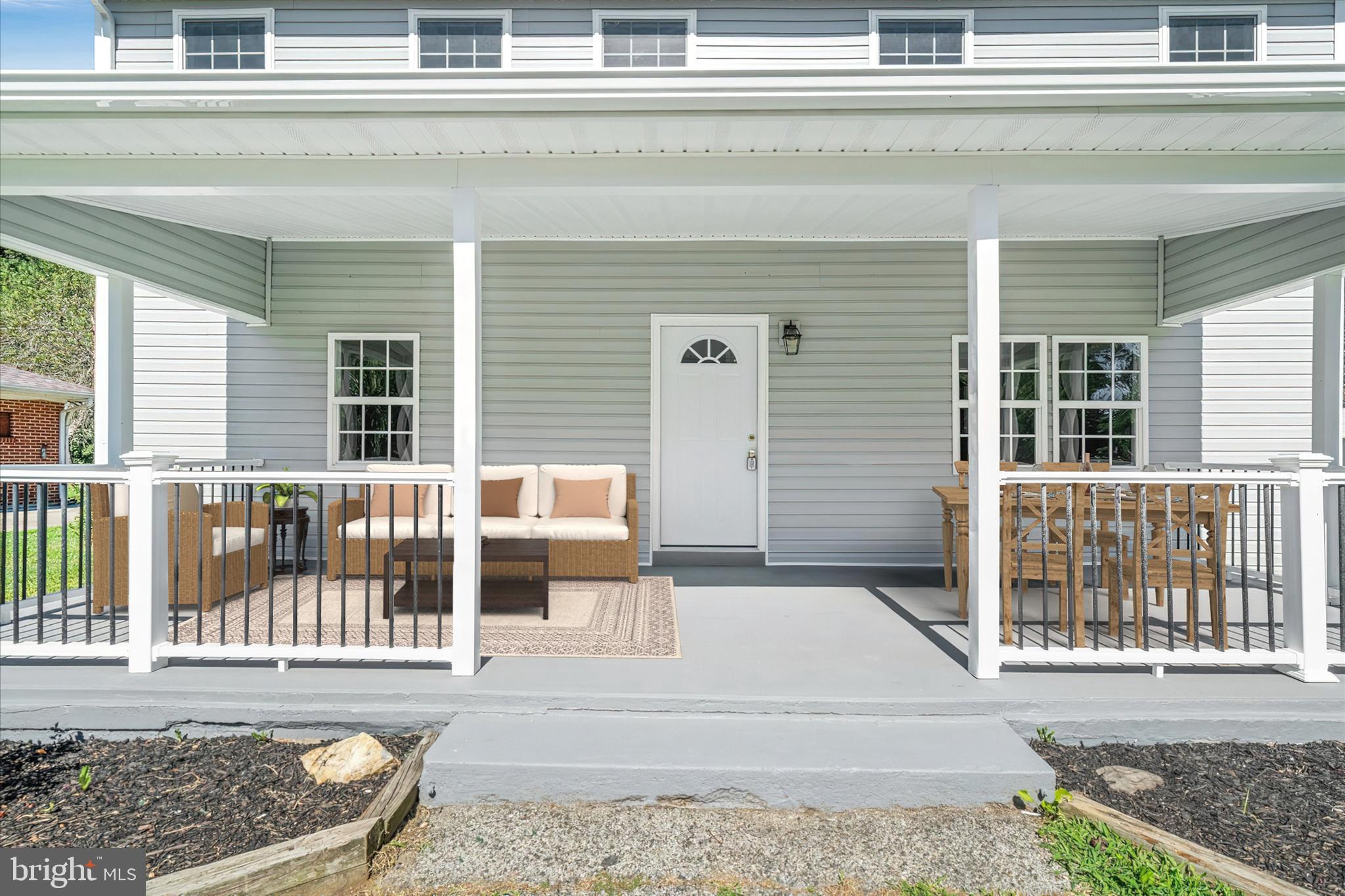 1239 Red Lion Road Bear, DE 19701 - Photo 2 of 29 front view of a house with a porch