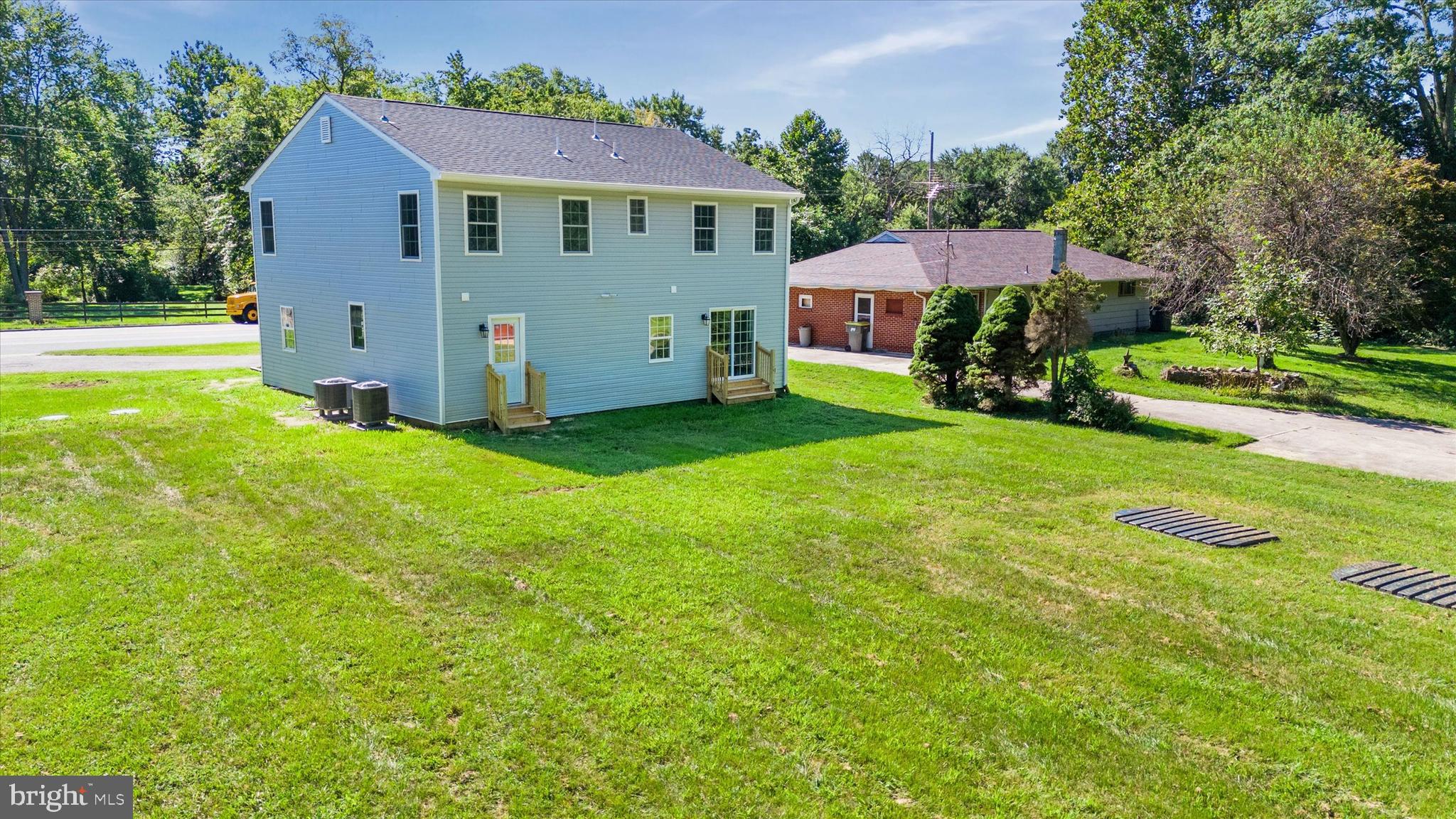 1239 Red Lion Road Bear, DE 19701 - Photo 24 of 29 a view of house with backyard and swimming pool
