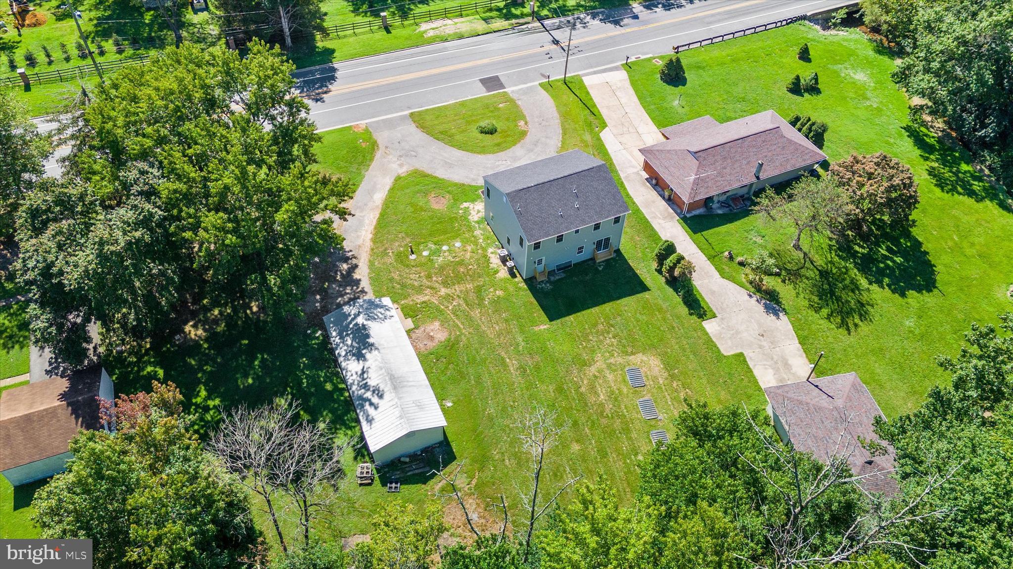 1239 Red Lion Road Bear, DE 19701 - Photo 25 of 29 an aerial view of residential house with outdoor space and swimming pool
