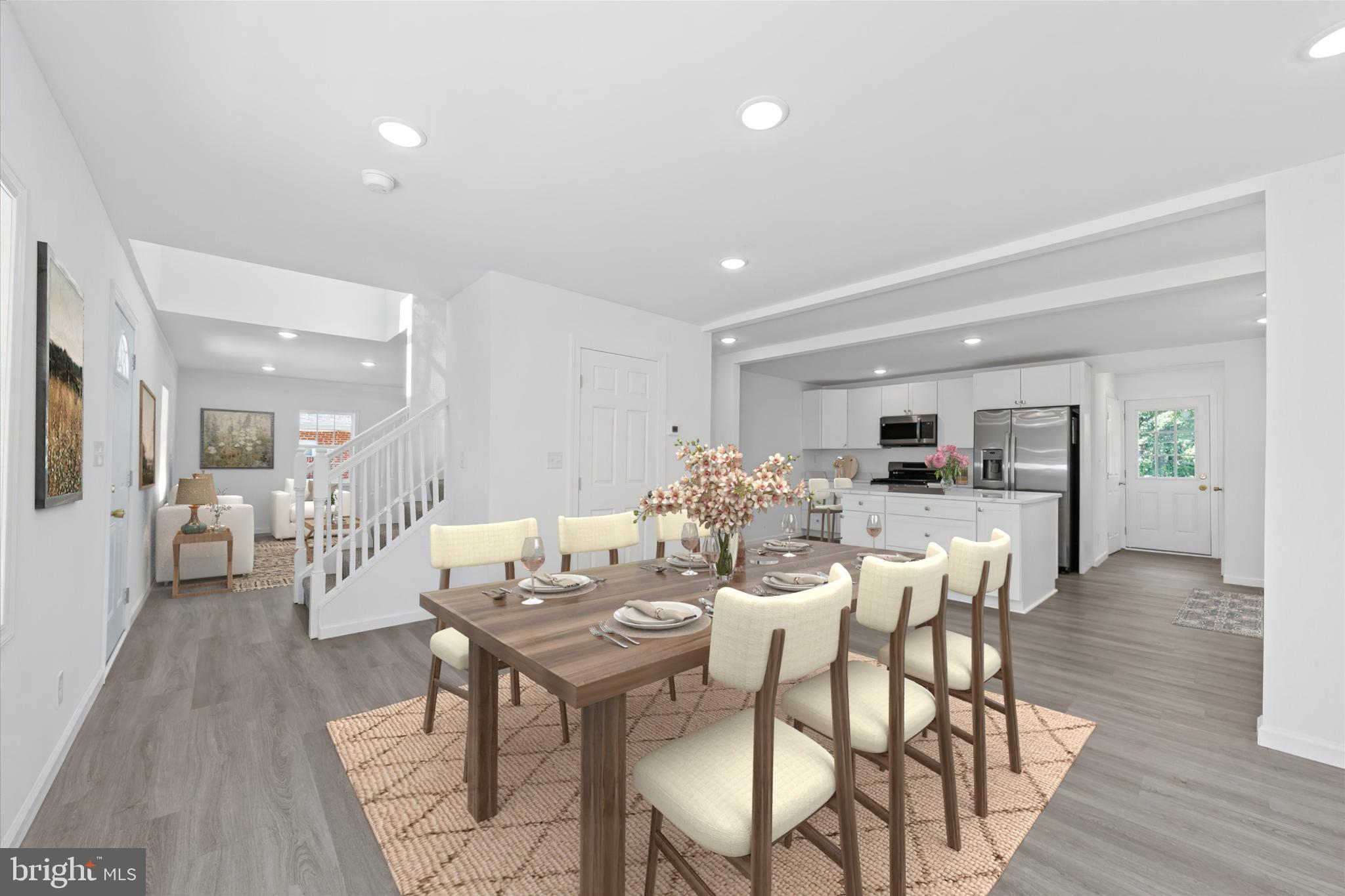 1239 Red Lion Road Bear, DE 19701 - Photo 4 of 29 a view of a dining room with furniture and wooden floor