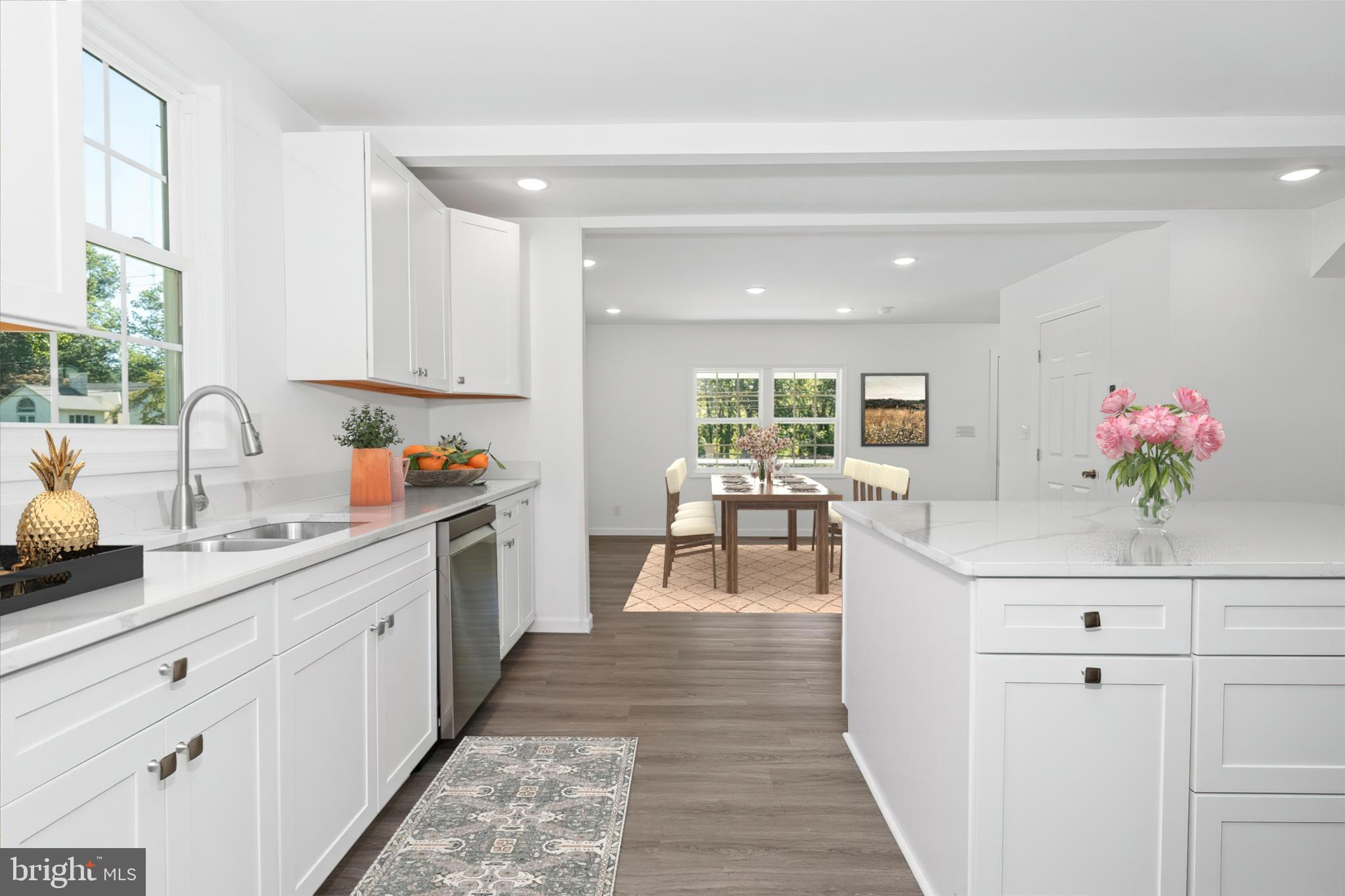 1239 Red Lion Road Bear, DE 19701 - Photo 6 of 29 a kitchen with sink cabinets and living room view