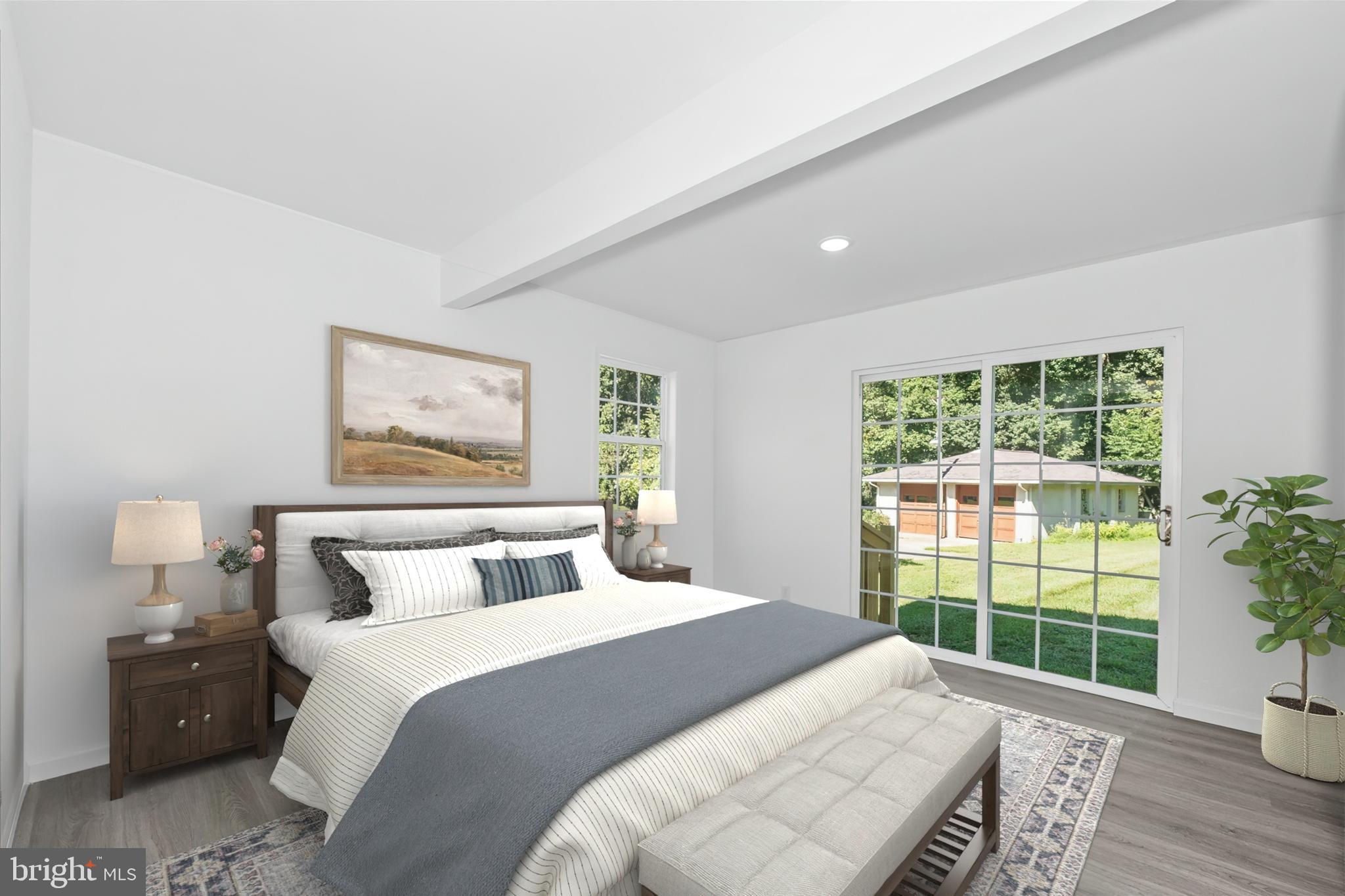 1239 Red Lion Road Bear, DE 19701 - Photo 7 of 29 a bedroom with a large bed and a window