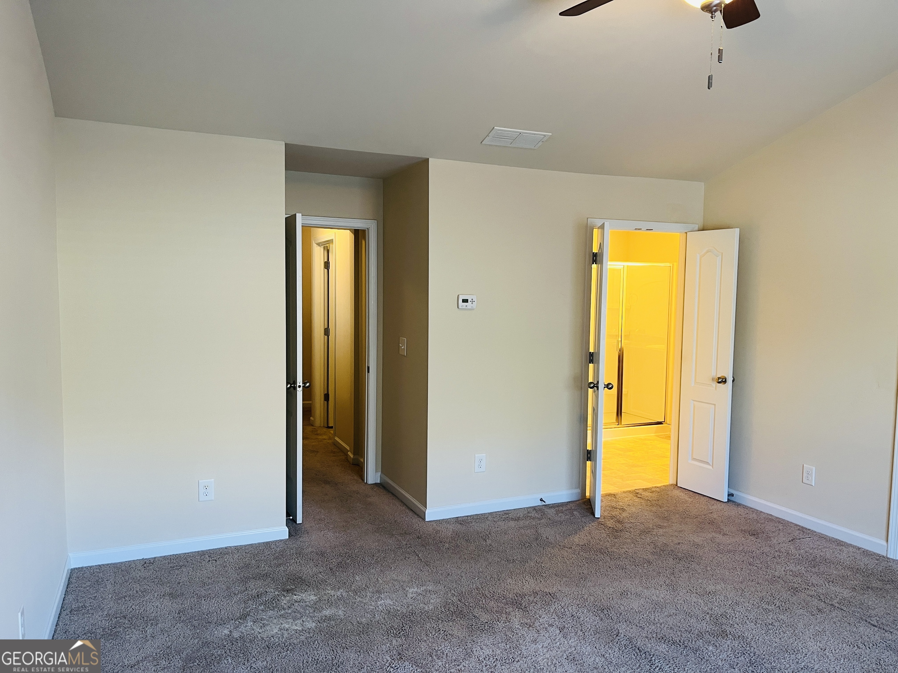 233 Bobbie Way Woodstock, GA 30189 - Photo 17 of 32 a view of an empty room with a window