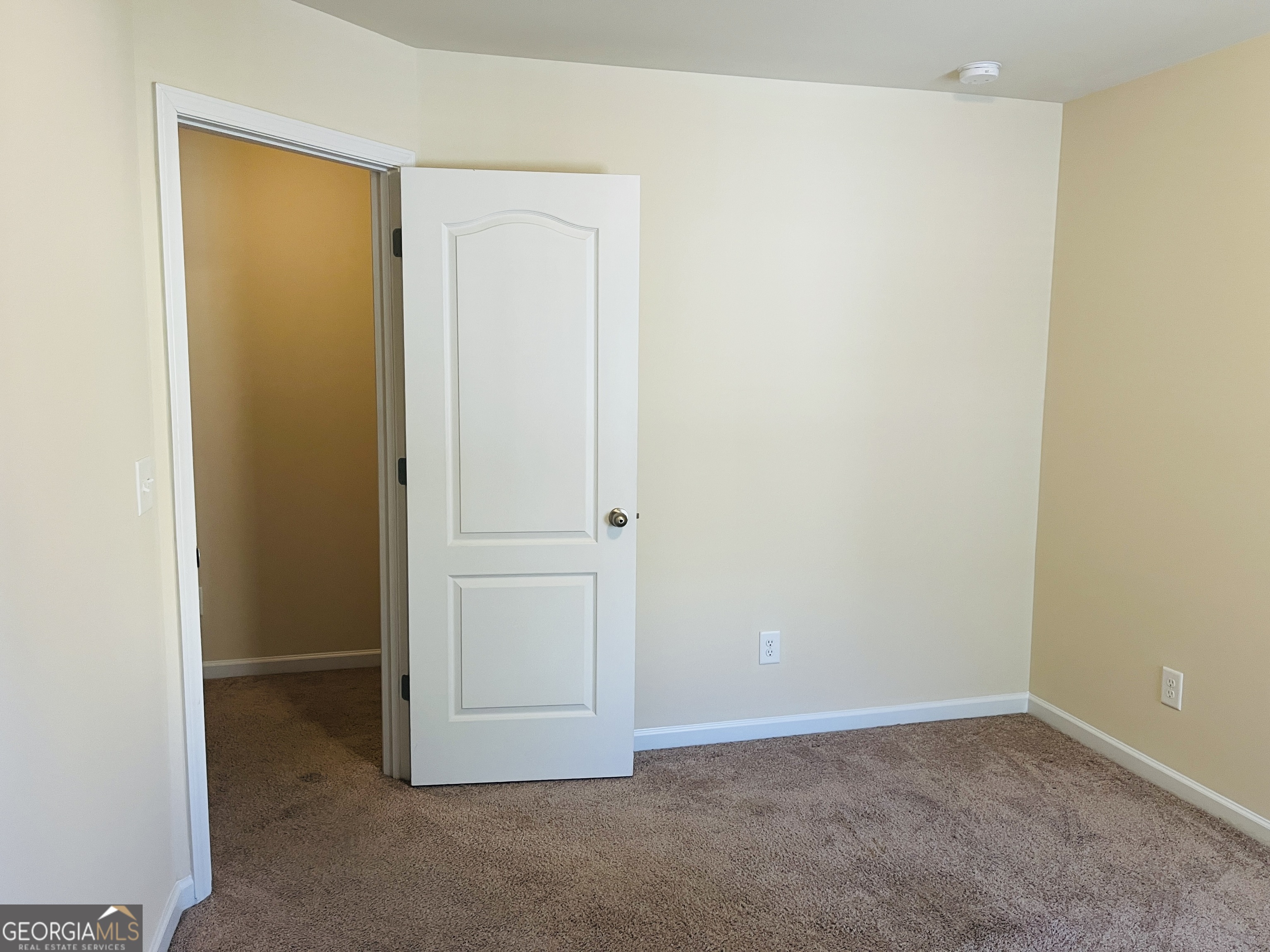 233 Bobbie Way Woodstock, GA 30189 - Photo 23 of 32 an empty room with closet area