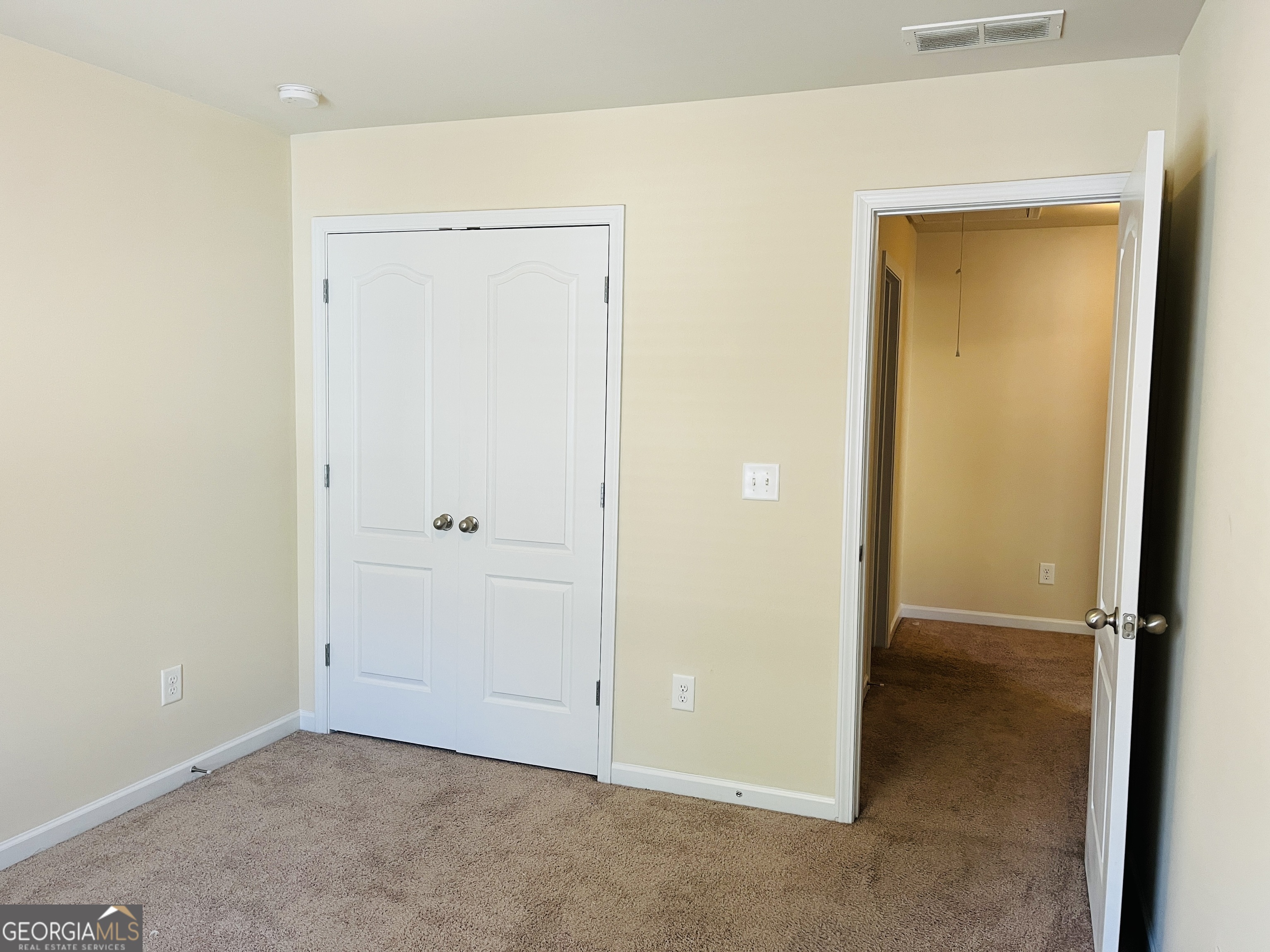 233 Bobbie Way Woodstock, GA 30189 - Photo 27 of 32 a view of an empty room