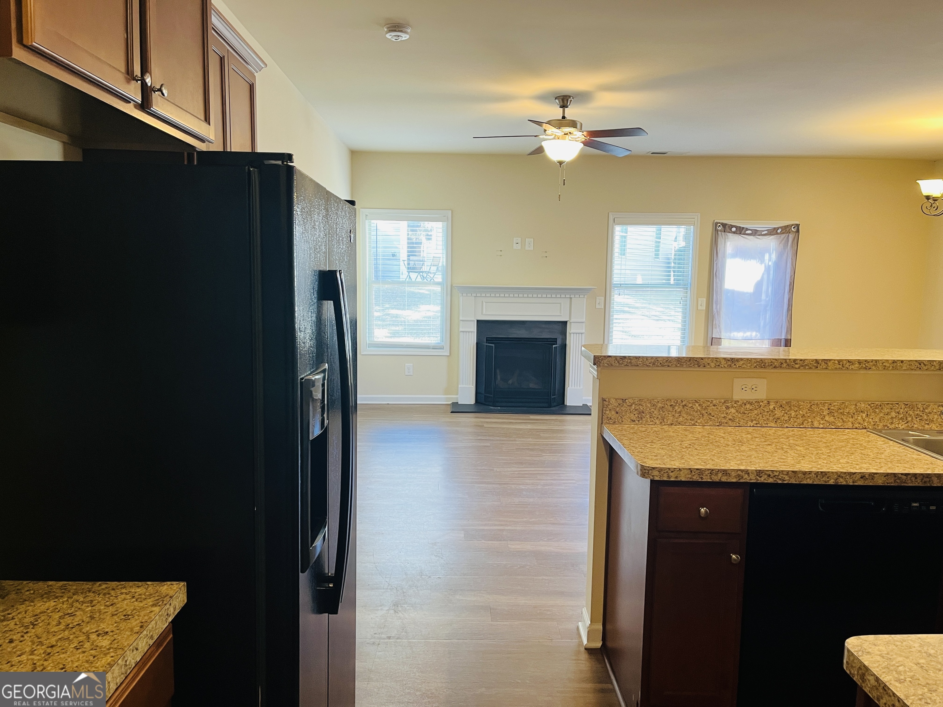 233 Bobbie Way Woodstock, GA 30189 - Photo 6 of 32 a view of a kitchen with a sink and a kitchen view