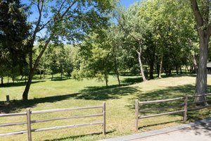 7750 Pine Bluff Road, Unit CH Morris, IL 60450 - Photo 19 of 21 a view of backyard with tree