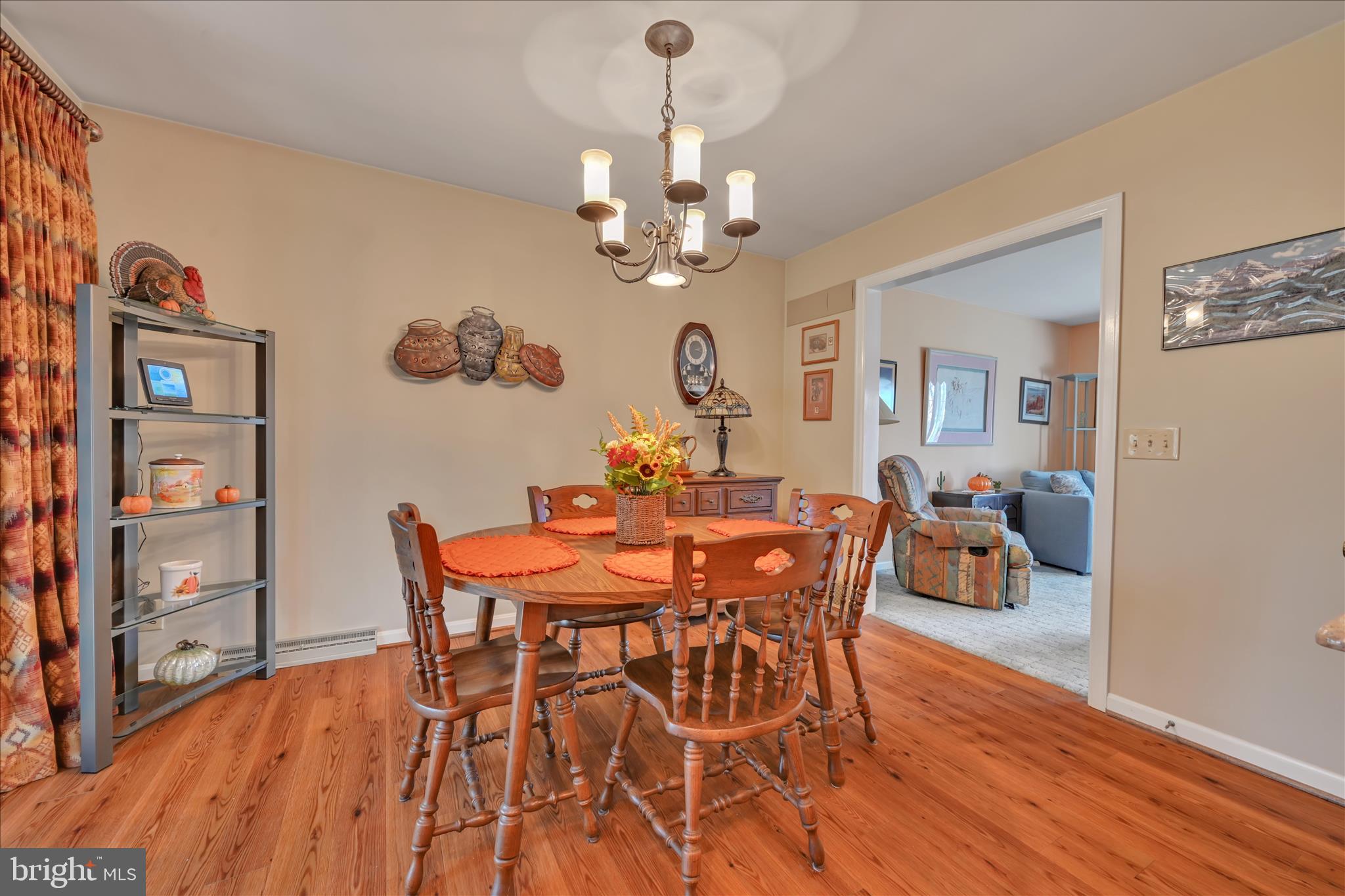 2295 Albern Boulevard Lancaster, PA 17601 - Photo 10 of 39 a view of a dining room with furniture wooden floor and a chandelier