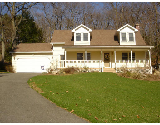 24 Merrill Road Wilbraham, MA 01095 - Photo 1 of 7 a view of a house with a backyard
