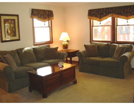 24 Merrill Road Wilbraham, MA 01095 - Photo 2 of 7 a living room with furniture and a window