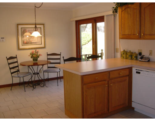 24 Merrill Road Wilbraham, MA 01095 - Photo 4 of 7 a kitchen with a sink cabinets and window