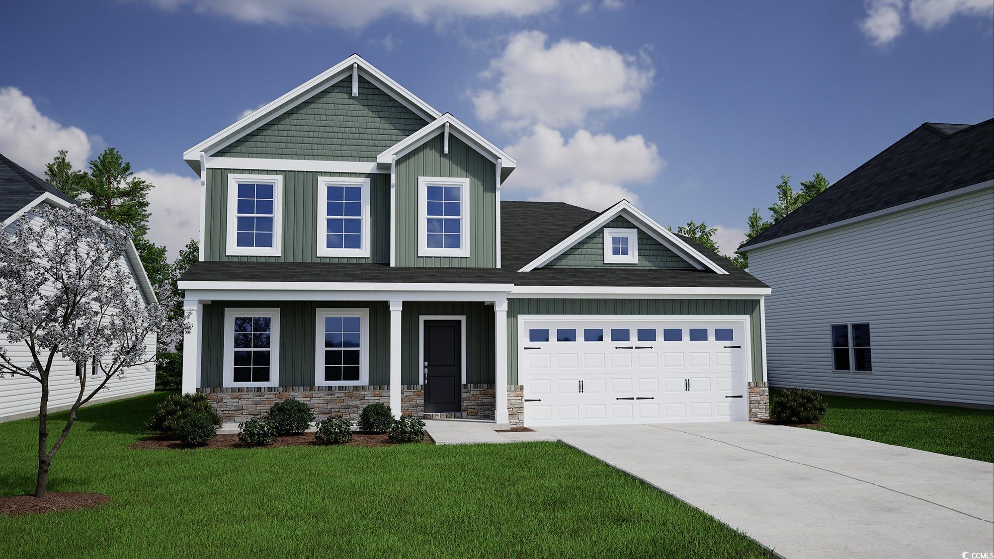 Craftsman house featuring board and batten siding, covered porch, stone siding, and a front yard