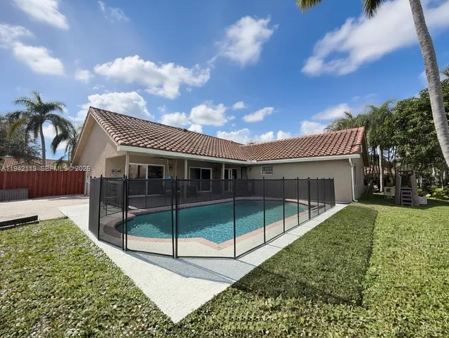 $865,000 | 12585 Southwest 9th Place, Davie, FL 33325