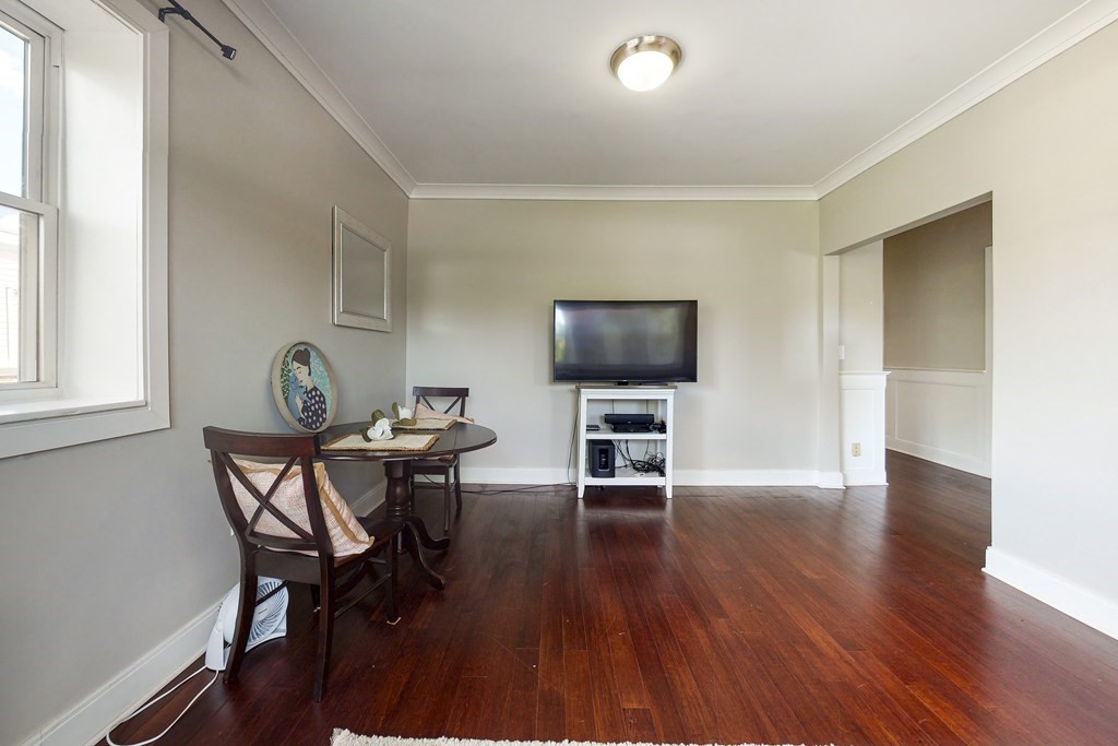1834 Beacon Street, Unit 16 Brookline, MA 02445 - Photo 13 of 21 a view of a livingroom with furniture and a flat screen tv