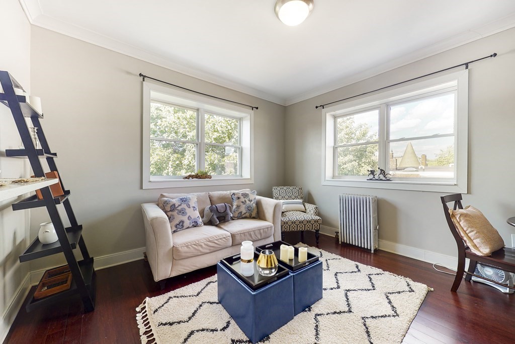 1834 Beacon Street, Unit 16 Brookline, MA 02445 - Photo 18 of 21 a living room with furniture and a window