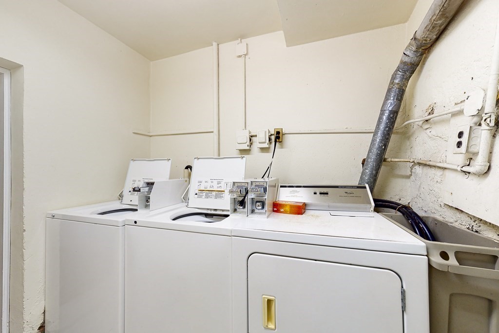 1834 Beacon Street, Unit 16 Brookline, MA 02445 - Photo 19 of 21 a utility room with dryer and washer