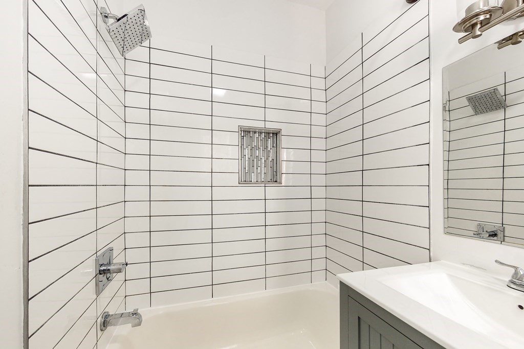 1834 Beacon Street, Unit 16 Brookline, MA 02445 - Photo 7 of 21 a bathroom with a sink and a shower