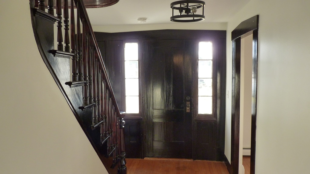 52 Valley Road Southampton, MA 01073 - Photo 6 of 18 a view of staircase with railing and frames on wall