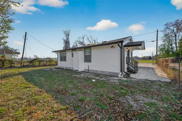 a view of a field with trees
