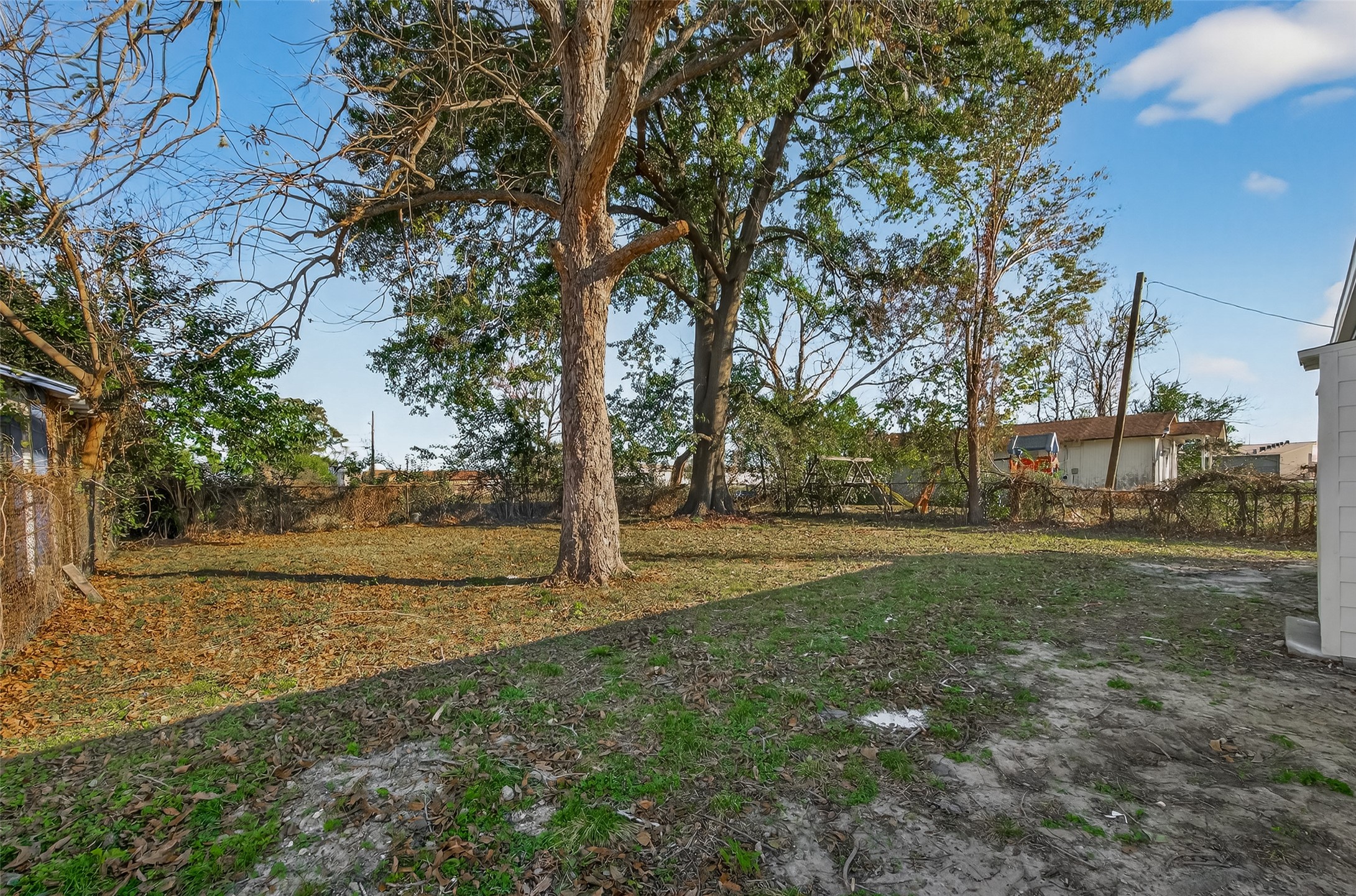 754 Prosper Street Houston, TX 77088 - Photo 28 of 28 a view of a field with trees