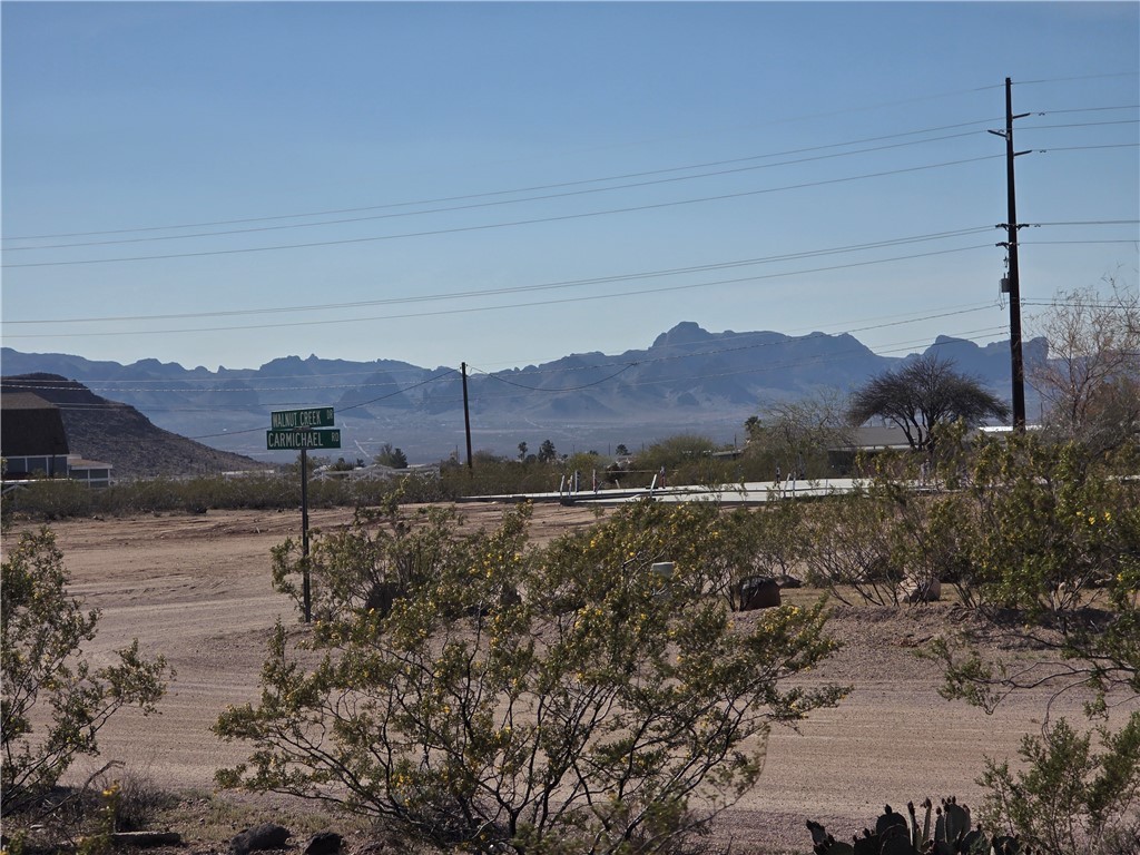 2904 Walnut Creek Road, Unit 2 LOT 5 Golden Valley, AZ 86413 - Photo 6 of 10 Expansive desert landscape with distant mountains providing a scenic backdrop