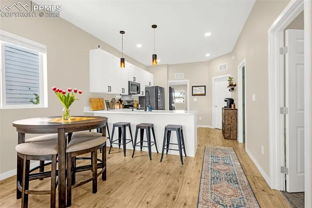 a view of a dining area with furniture