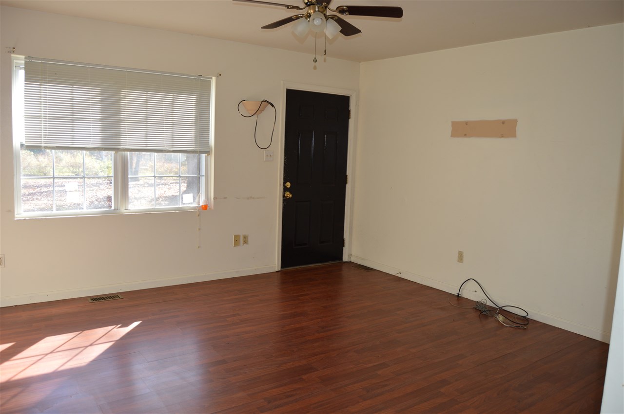 3333 Ridge Road Palmyra, VA 22963 - Photo 3 of 9 a view of an empty room with a window