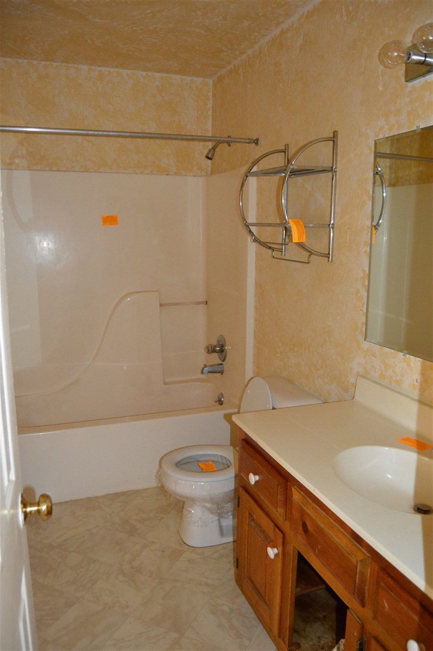 3333 Ridge Road Palmyra, VA 22963 - Photo 6 of 9 a bathroom with a sink a toilet and shower