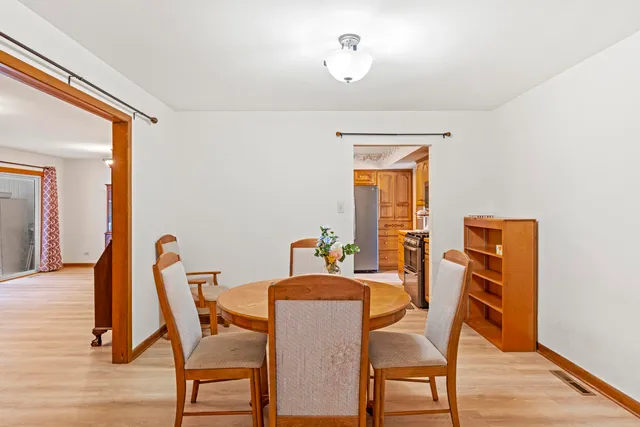 a workspace with furniture and a flat screen tv