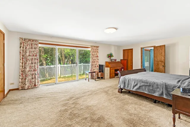 a bathroom with a shower and a mirror