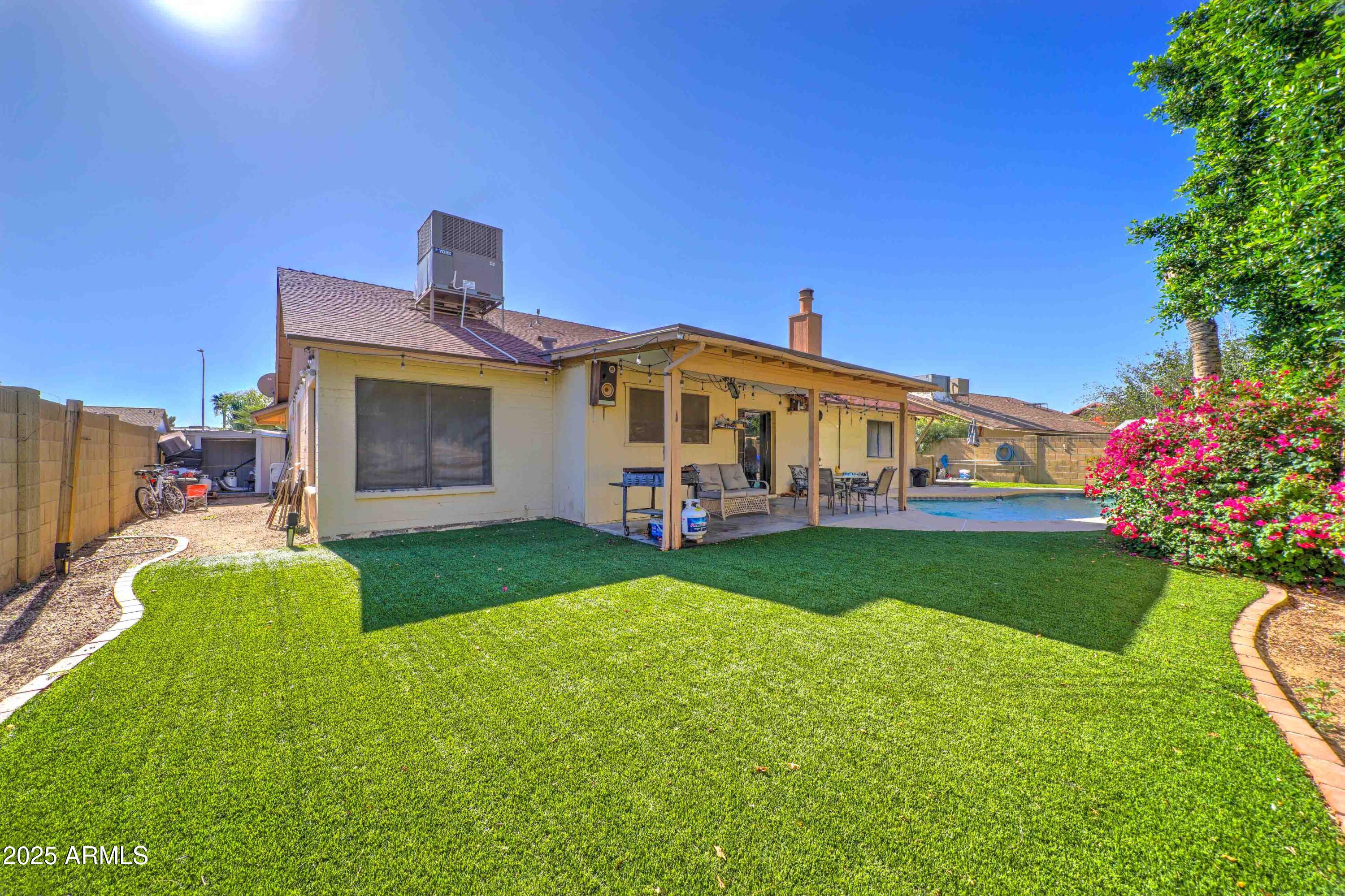 a view of a house with a big yard