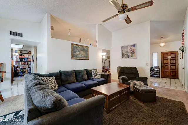 a living room with furniture and a couch