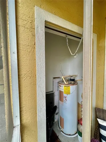 a view of a hallway with a livingroom and a living room