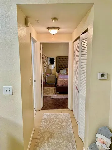 a bathroom with a sink mirror and vanity