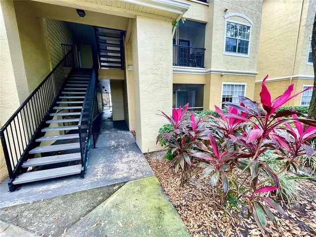 a view of entryway with flower pots