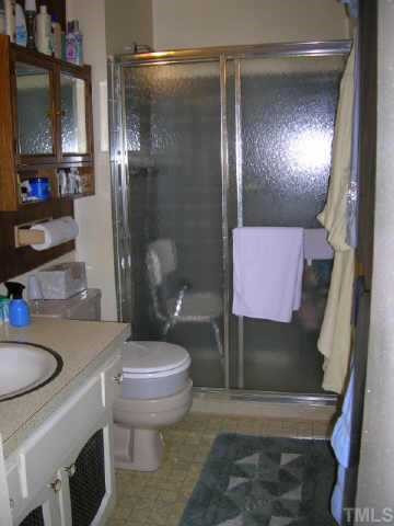 417 Harvard Street Raleigh, NC 27609 - Photo 7 of 9 Master bath is clean and in good condition. Other