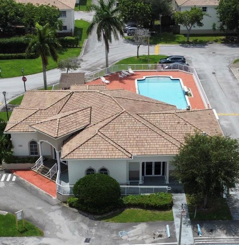 14116 Southwest 260th Street, Unit 106 Homestead, FL 33032 - Photo 24 of 24 a view of a house with backyard and sitting area