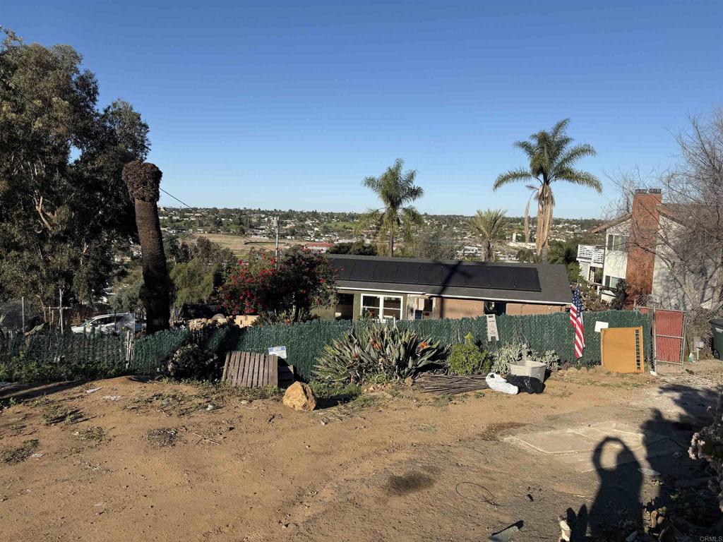 1726 Helix Street Spring Valley, CA 91977 - Photo 4 of 7 a view of a house with a patio