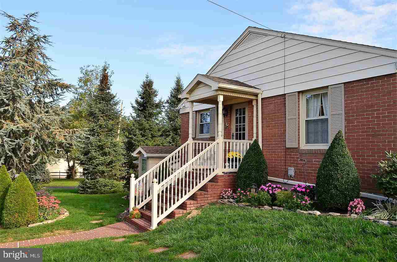 195 West Hoke Street Spring Grove, PA 17362 - Photo 3 of 33 a front view of a house with a yard