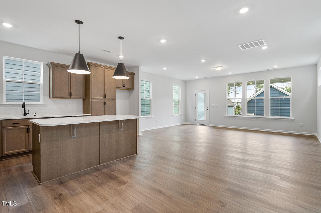 113 Savannah Moss Way Raleigh, NC 27603 - Photo 6 of 22 Kitchen/Great Room