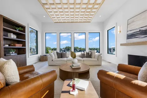 a stove top oven sitting inside of a kitchen