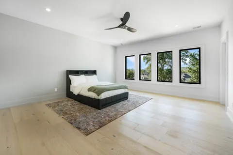 a view of living room and wooden floor