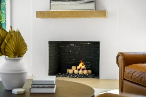 a kitchen with a table and chairs in it