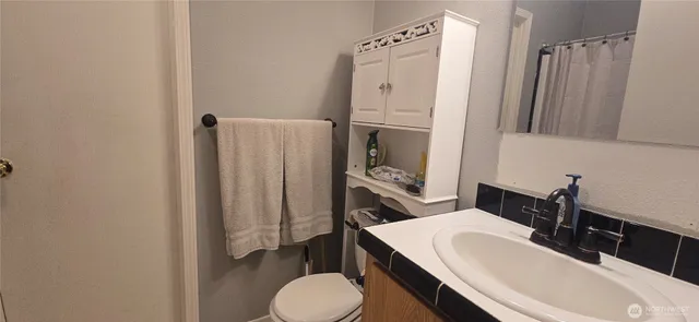 a bedroom with a bed and a closet