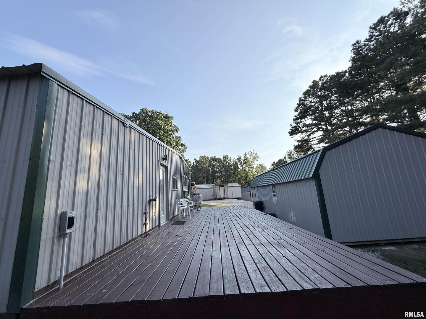 5435 Hickory Ridge Road Pomona, IL 62975 - Photo 13 of 77 a view of backyard with a deck and wooden floor